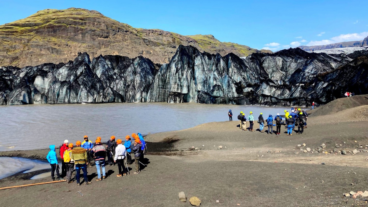 A group walking to Sólheimajökull